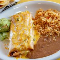 Chimichanga · Seasoned beef or chicken rolled into a flour tortilla, crisp-fried, and topped with Chile co...