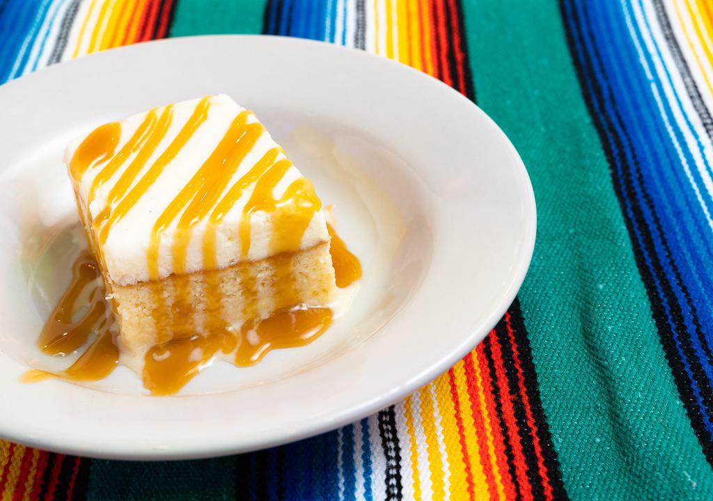 Tres Leches · A moist three milk cake with dairy whipped cream icing and drizzled with bourbon flavored caramel sauce.