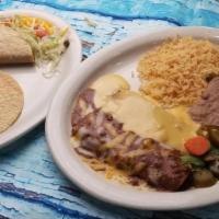 Senor Don · One cheese enchilada with chili, one cheese taco topped with chile con queso, one toasted me...