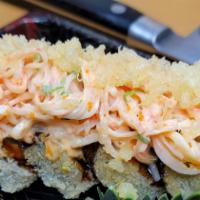 Crunchy Philly (Deep-Fried) · Smoked salmon, cream cheese, avocado, deep-fried topped with spicy crabstick salad, eel sauc...