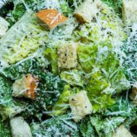 Caesar Salad · Romaine, Homemade Garlic Croutons, Romano, and a Homemade Caesar Dressing