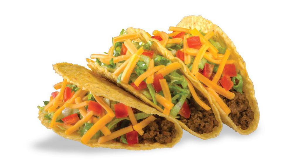 Texas T-Brand Tacos® (3) · Three tacos packed with beef, shredded cheese, crisp lettuce, and ripe tomatoes, and served with DQ® taco sauce on the side.