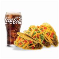 Texas T-Brand Tacos Combo · Three tacos packed with beef, shredded cheese, crisp lettuce, and ripe tomatoes and served w...