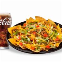 Nacho Deluxe · Large platter of crispy fresh tortilla chips covered with seasoned beef, refried beans, nach...