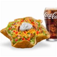 Taco Salad Chicken Combo · Crispy tortilla bowl filled with sliced grilled chicken breast, shredded cheddar cheese, cri...