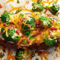 The Buckin' Broc'N Cheese    · A big ol’ spud topped with heaps of broccoli, a ladleful of broccoli cheese soup, a load of ...