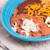 Mamas Enchilada Dinners · Spicy beef or cheese and onion enchiladas with chili con carne or chicken enchiladas with so...