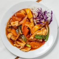 Stir Fried Sweet And Sour · Your choice of protein stir-fried in traditional sweet and sour sauce with bell peppers, tom...