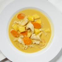 Yellow Curry · Yellow curry paste with coconut milk, potatoes, onions, and carrots.