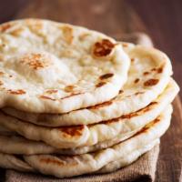 Plain Naan Bread · Handmade freash baked bread that is made to order in 7 minutes