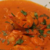 Nirvana · Choice of protein grilled and cooked in coconut masala curry with chili.