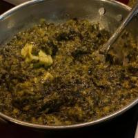 Saag Paneer · Homemade cheese and spinach sautéed with a touch of cream.