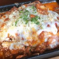 Traditional Beef Lasagna · Tomato Sauce, Fresh Ricotta, Mozzarella