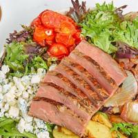 Flatiron Salad · Mixed greens, 100% grass-fed steak, roasted fingerling potato, roasted cherry tomato, blue c...