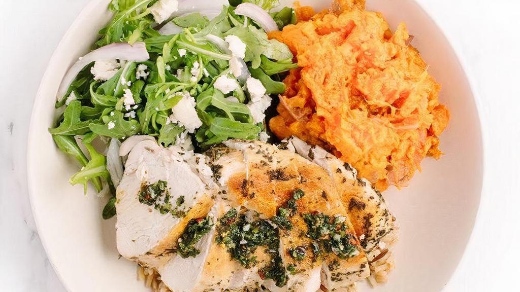 Hand Carved Chicken · antibiotic-free, herb marinated chicken over bed of warm organic rice & quinoa, with chimichurri and two sides