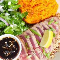 Line-Caught Tuna · line-caught Ahi tuna, grilled medium-rare, with sesame ginger sauce & scallions on a bed of ...
