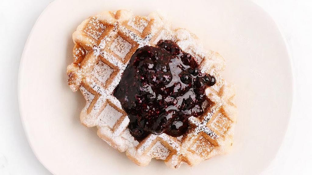 Pearl Sugar Waffle · Blueberry chia jam, powdered sugar, Belgian dessert waffle