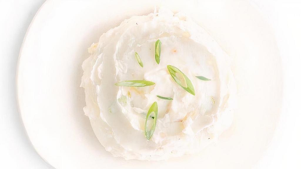 Garlic Mashed Potato · potatoes mashed with roasted garlic, real butter, cream and green onions.