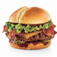 Smoke & Pepper™ · Black-peppered bacon, Cheddar, lettuce, dill pickle planks and Smoke & Pepper™ ketchup on a ...