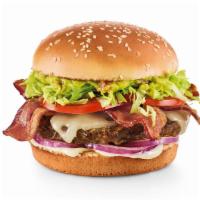 Guacamole Bacon Burger · House-made guac, hardwood-smoked bacon, Swiss, red onions, lettuce, tomatoes and mayo. 930 c...