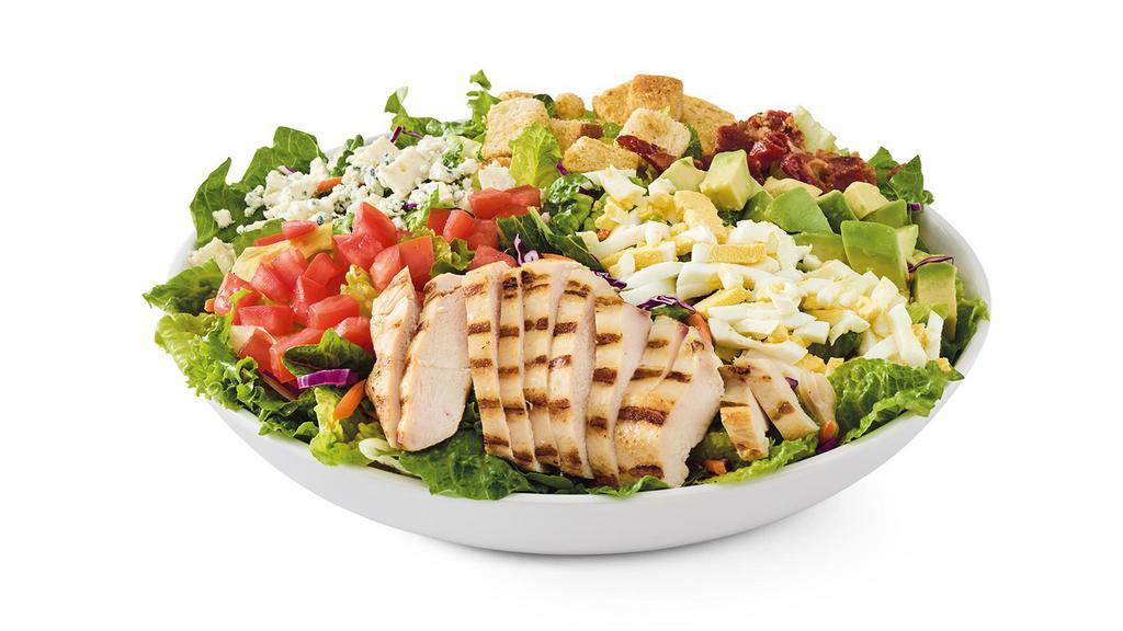 Avo-Cobb-O · Grilled chicken breast, hardwood-smoked Bacon, Bleu cheese crumbles, hard-boiled Eggs, tomatoes, croutons & avocado on Mixed greens. Served with dressing. Cal 510.