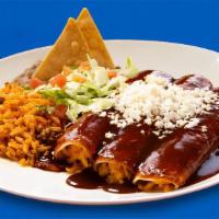 Enchiladas Rojas (Cheddar Cheese) · These are our Tex-Mex style enchiladas. Soft-rolled corn tortilla dipped in red sauce, ﬁlled...