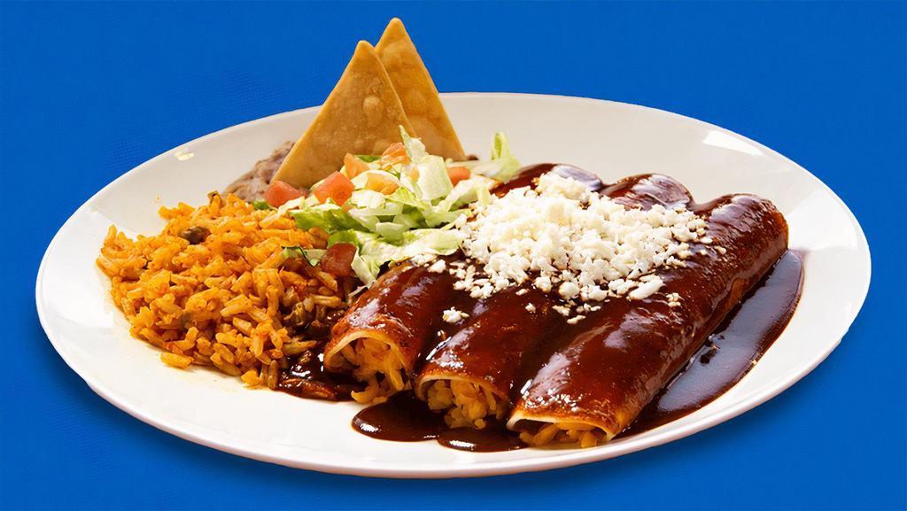 Enchiladas Rojas (Cheddar Cheese) · These are our Tex-Mex style enchiladas. Soft-rolled corn tortilla dipped in red sauce, ﬁlled with cheddar cheese and topped with Cotija cheese. Comes with red rice and refried beans.