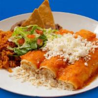 Entomatadas (Fresh Cheese) · Three soft-rolled corn tortillas ﬁlled with fresh cheese and topped with tomato sauce and mo...