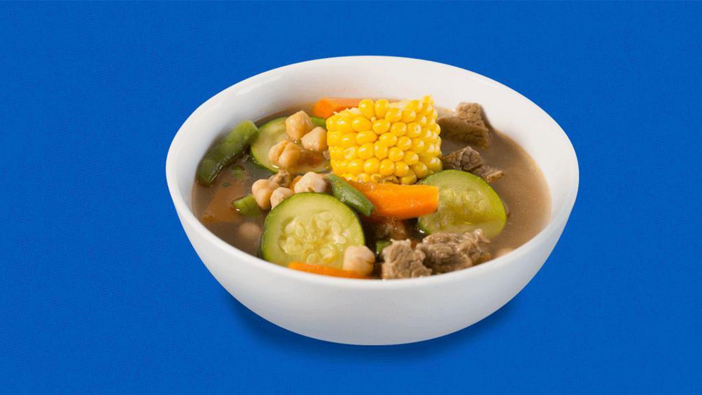 Caldo De Res Large · This soup includes beef, green beans, carrots, chickpeas, zucchini and corn-on-the cob. It’s served with a side of traditional Mexican red rice, red hot sauce, fresh onion, cilantro and limes.