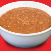 Refried Beans Regular · No introductions needed, our refried beans are the perfect addition to each dish.