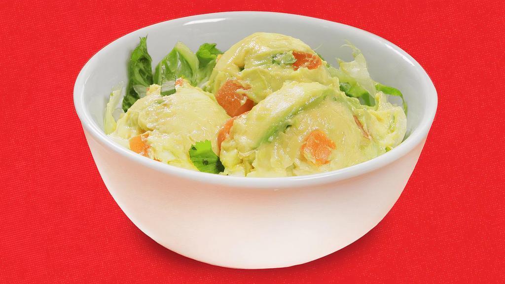Guacamole Large · Our guacamole is made with fresh and enticing avocado mixed with our famous pico de gallo.