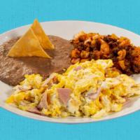 Ham & Egg Plate · Our scrambled ham and egg is served with refried beans, and a side of our breakfast chorizo ...