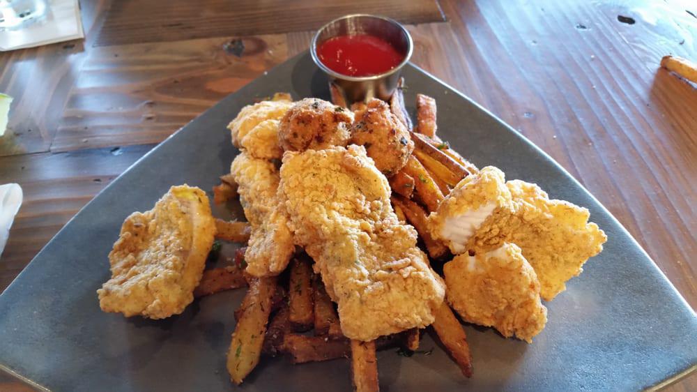Fried Catfish Basket  · 3 Redfin’s breaded catfish portions with signature fries. jalapeño tartar sauce and ketchup