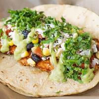Orange · Blackened salmon topped with a grilled corn and black bean relish, cotija cheese and cilantr...