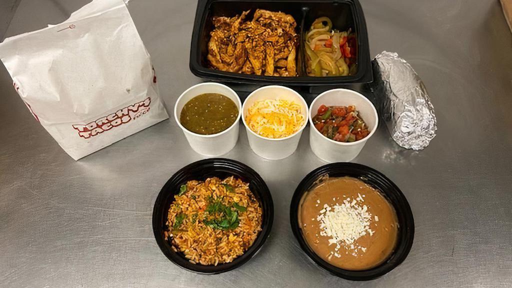 Family Pack Chicken Fajita · Family packs serve 4-5 people! Marinated & Grilled Chicken Breast, Grilled Onions & Peppers, Pico de Gallo, Cheddar Jack Cheese, Tomatillo sauce.  Includes Homemade Chips, Beans, Rice & your choice of Tortillas (Flour, Corn, Combo).