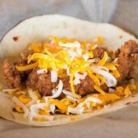 Fried Chicken Taco · Fried chicken & mixed cheese on a flour tortilla. Dairy, Soy, Gluten