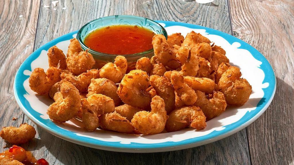 New! Coconut Shrimp · Poppable golden shrimp coated in a crispy coconut breading served with a sweet, spicy and tangy apricot chili dipping sauce