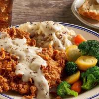 Chicken Fried Steak · Our famous choice beef steak, hand-breaded and southern fried to perfection, topped with our...