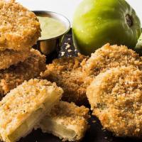 Fried Green Tomatoes · Sliced green tomatoes, hand-battered and golden fried, served with homemade ranch or avocado...