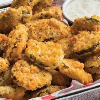Fried Pickles · Tangy, dill pickles, hand-battered and golden fried, served with homemade ranch or honey mus...