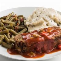 Meatloaf · Family favorite, scratch-made meatloaf, topped with savory, homemade tomato sauce