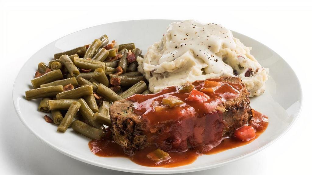 Meatloaf · Family favorite, scratch-made meatloaf, topped with savory, homemade tomato sauce