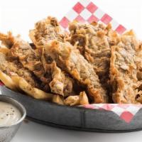Steak Fingers · Served with our scratch-made cream gravy or your choice of dipping sauce .