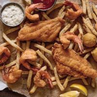 Super Combo Fish & 4 Shrimp · Lightly breaded, crispy fried catfish fillets and golden-brown jumbo shrimp, served over fre...