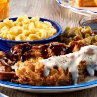 Chicken Fried Brisket · The two best tastes of Texas combined to bring you smoked brisket, hand-breaded and southern...