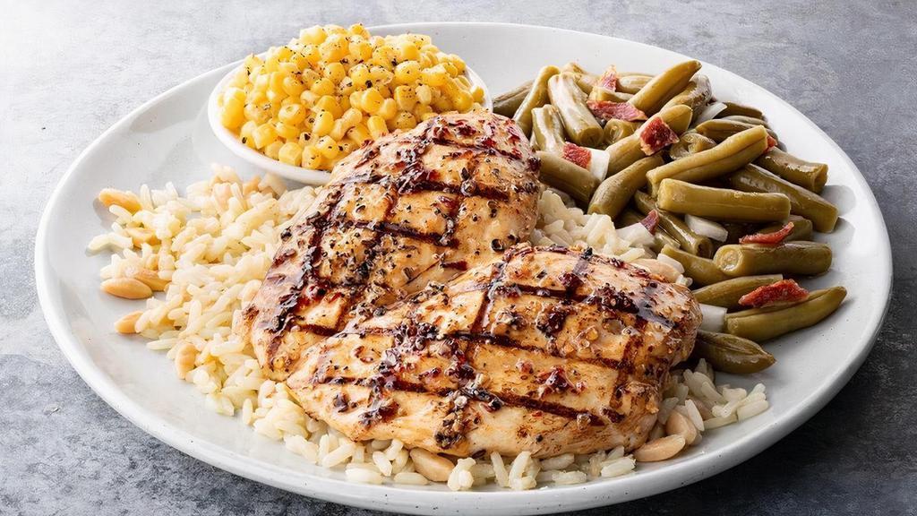 Chipotle Maple Chicken · Grilled, boneless chicken breast, covered in our sweet and spicy homemade chipotle maple glaze, served over seasoned rice
