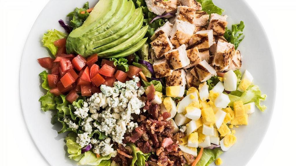 Cobb Salad · Sliced avocado, bacon, bleu cheese crumbles, tomatoes, chopped egg, and fresh mixed greens with homemade ranch or your choice of dressing.