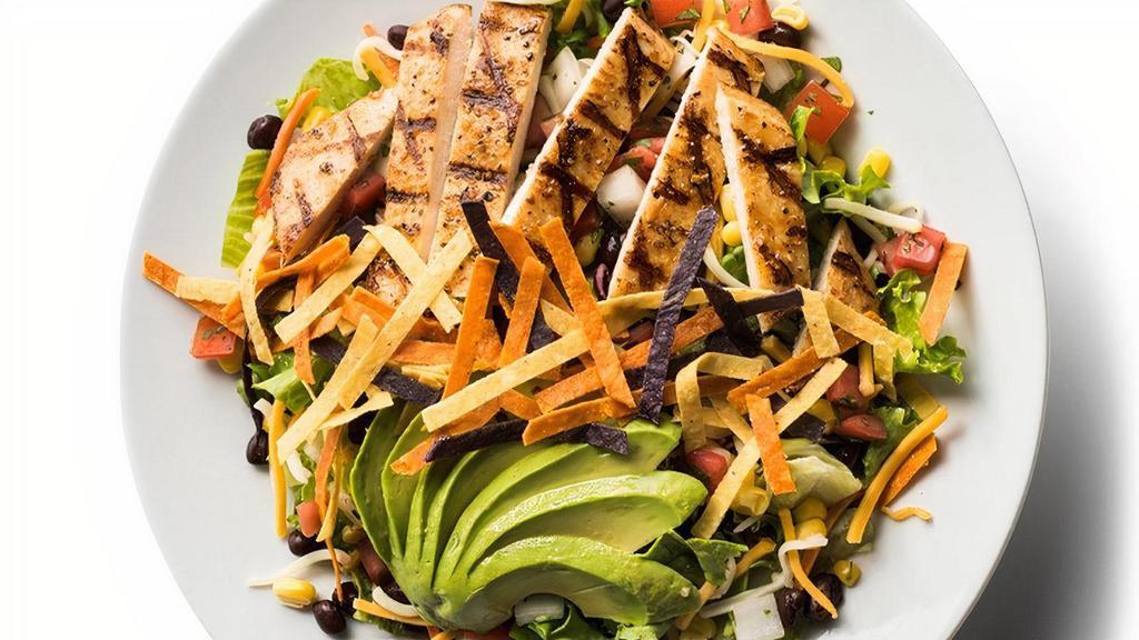 Tex Mex Salad · Cheese, black beans, corn salsa, fresh avocado, topped with tortilla strips and served with homemade avocado ranch or your choice of dressing.