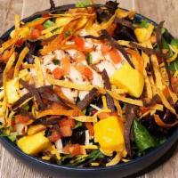 New! Mango Salad · Grilled chicken, spring mix, shredded cheese, diced mangos, topped with pico de gallo, serve...