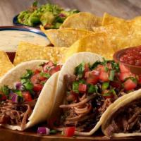 Brisket Street Tacos · Three warm tortillas filled with smoked brisket, Dr Pepper BBQ sauce, fresh pico de gallo, s...